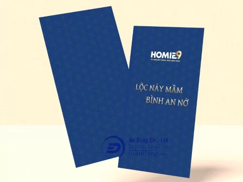 Mẫu bao lì xì sang trọng với nền in hình họa tiết hoa mai tinh tế cho công ty bất động sản Homie9