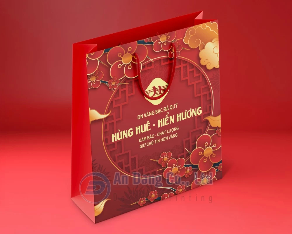 Mẫu túi giấy đựng vàng do In An Đăng thiết kế cho doanh nghiệp vàng bạc đá quý Hùng Huê - Hiển Hương