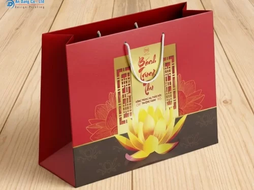 Mẫu túi giấy đựng bánh trung thu sử dụng tông màu đỏ - vàng làm chủ đạo